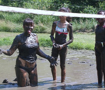 Our one-of-a-kind mud volleyball court could serve as an area for a serious game of competitive volleyball, but most of the time, it provides the venue for sticky, muddy, messy fun! Choose this activity and get ready to get dirty!