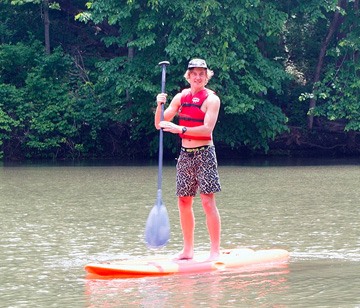 Stand-Up Paddleboarding on the Leaf River at Camp Kupugani