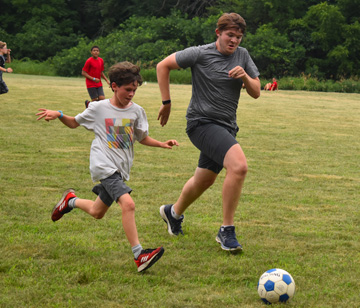 Ready for a game of soccer, touch football, or a cool and refreshing game of water softball? During our summer recreation activities, campers can compete in their favorite sport or learn new games like Aussie rugby or a variety of other games involving strategy and lots of fun. We emphasize sportsmanship, effort, maintaining a positive attitude, developing skills and teamwork, and learning the rules of the game.