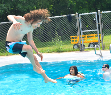 Swimming is always a fun activity on a warm summer day. Our beautiful 30- by 60-foot fully-staffed swimming pool, located in the heart of camp, is the venue for swimming supervision from our certified lifeguards, fun pool games, and diving from our one-meter board.